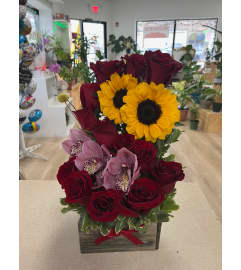 Silhouette wood box. An arrangement by Spring Garden Flowers. Silhouette wood box. An arrangement by Spring Garden Flowers.