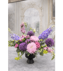 The Violet. An arrangement by Grande Prairie Florist. The Violet. An arrangement by Grande Prairie Florist.