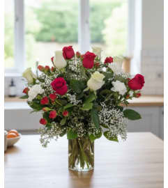 All my heart vase arrangement. An arrangement by Sophie's Flowers.