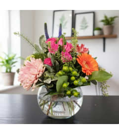 Pink and Purple in a vase. An arrangement by Sophie's Flowers.