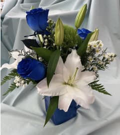 Blue Moon Romance. An arrangement by Roma Flowers and Gifts. Blue Moon Romance. An arrangement by Roma Flowers and Gifts.