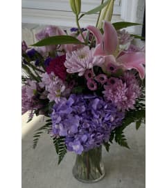 My Purple Passion. An arrangement by Seasons Change Designs. My Purple Passion. An arrangement by Seasons Change Designs.