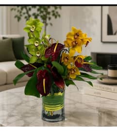 Cymbidium Ochid with Red Anthurium. An arrangement by Anthurium Gardens Florist. Cymbidium Ochid with Red Anthurium. An arrangement by Anthurium Gardens Florist.