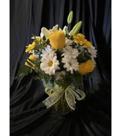 MF Florist's Choice Yellow. An arrangement by Magic Flowers Inc..