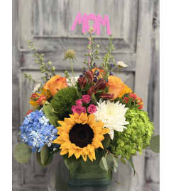 Sunshine and Joy Bouquet. An arrangement by M's Flowers. Sunshine and Joy Bouquet. An arrangement by M's Flowers.