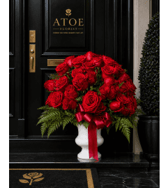 Luxe Signature 60 Red Rose Bouquet. An arrangement by A Touch of Elegance Florist and Events LLC. Luxe Signature 60 Red Rose Bouquet. An arrangement by A Touch of Elegance Florist and Events LLC.