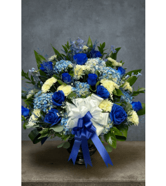 Blue Serenity Tribute. An arrangement by Elegant Florist. Blue Serenity Tribute. An arrangement by Elegant Florist.