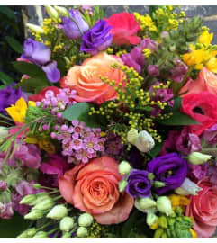 Designers Choice Wrapped Bouquet of Mixed Flowers. An arrangement by Renton Flower Shop. Designers Choice Wrapped Bouquet of Mixed Flowers. An arrangement by Renton Flower Shop.