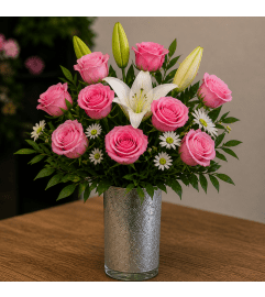 Blushing Charm Vase. An arrangement by Country Floral's Seasons, LLC.