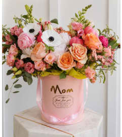 Mothers Day Super Special. An arrangement by Geni's Florist and Gifts. Mothers Day Super Special. An arrangement by Geni's Florist and Gifts.