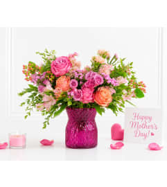 Mothers Day Special Now. An arrangement by Geni's Florist and Gifts. Mothers Day Special Now. An arrangement by Geni's Florist and Gifts.