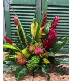 Vibrant Island Glow. An arrangement by Forest Florist. Vibrant Island Glow. An arrangement by Forest Florist.