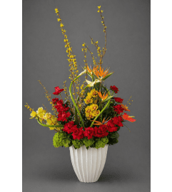The Grand Tropical. An arrangement by Simply Beautiful Flowers and Events.