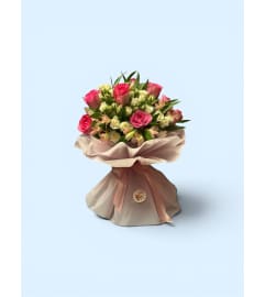 Sweet Petal Embrace. An arrangement by Flowers and Fruit Designs.