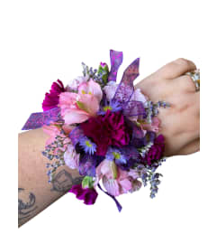 Violet Confetti Prom Wristlet. An arrangement by In Bloom.
