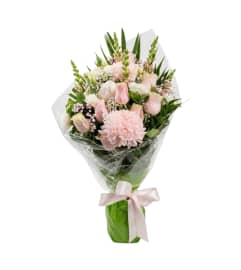Pink wrapped bouquet. An arrangement by DMP Flowers and Gifts.