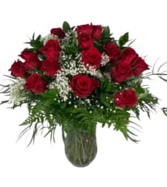 24 classic red roses. An arrangement by DMP Flowers and Gifts. 24 classic red roses. An arrangement by DMP Flowers and Gifts.