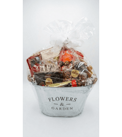 Large Nutty Chocolatier gourmet goodie basket. An arrangement by DMP Flowers and Gifts. Large Nutty Chocolatier gourmet goodie basket. An arrangement by DMP Flowers and Gifts.