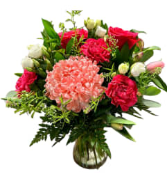 Spring into summer. An arrangement by DMP Flowers and Gifts. Spring into summer. An arrangement by DMP Flowers and Gifts.
