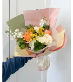 Sunny Garden Bouquet. An arrangement by Queens Flowers.