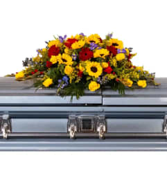 Joyful Remembrance Casket Spray. An arrangement by Anne Marie Rose Floral Design. Joyful Remembrance Casket Spray. An arrangement by Anne Marie Rose Floral Design.