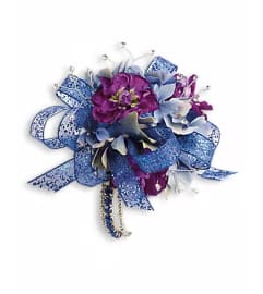 Feel The Beat Corsage. An arrangement by Ada's Flowers.