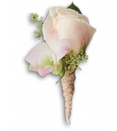 Dashing Boutonniere. An arrangement by Ada's Flowers.