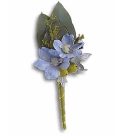 Hero's Blue Boutonniere. An arrangement by Ada's Flowers.