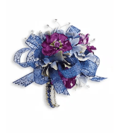 Feel The Beat Corsage. An arrangement by April Showers Floral Designs. Feel The Beat Corsage. An arrangement by April Showers Floral Designs.