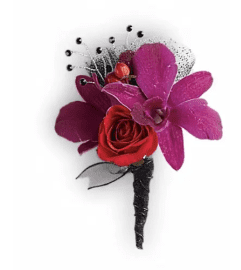 Celebrity Style Boutonniere. An arrangement by April Showers Floral Designs. Celebrity Style Boutonniere. An arrangement by April Showers Floral Designs.