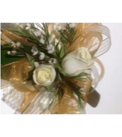 Pure Gold Wrist Corsage. An arrangement by Very's Flowers.