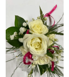 White and Pink Wrist Corsage. An arrangement by Very's Flowers.