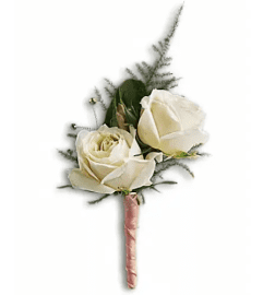 White Tie Boutonniere. An arrangement by Fendley Florists.