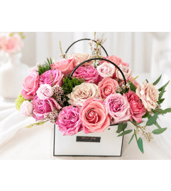 Blooming Rose Purse. An arrangement by Floral Lady Design Studio LLC.