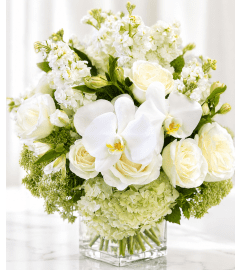 Serene White Symphony. An arrangement by Floral Lady Design Studio LLC.