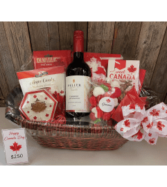 Canada Day basket. An arrangement by Flowers 4 U Helping Hand.