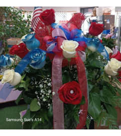 Patriotic Rose Elegance. An arrangement by Howard Beach Florist.