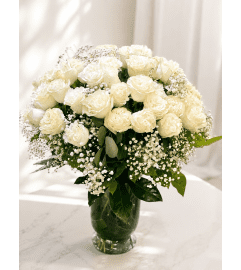 Timeless White Grace. An arrangement by Floral Lady Design Studio LLC. Timeless White Grace. An arrangement by Floral Lady Design Studio LLC.