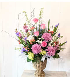 Pink Willow Pedestal. An arrangement by Block Farms Flowers. Pink Willow Pedestal. An arrangement by Block Farms Flowers.