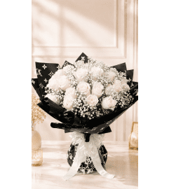 Whispering White Roses. An arrangement by Floral Lady Design Studio LLC. Whispering White Roses. An arrangement by Floral Lady Design Studio LLC.