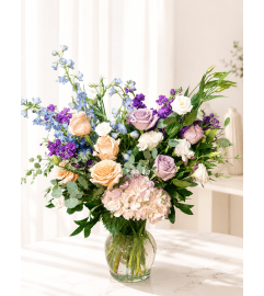 Peach and Purple Dream Bouquet. An arrangement by Floral Lady Design Studio LLC. Peach and Purple Dream Bouquet. An arrangement by Floral Lady Design Studio LLC.
