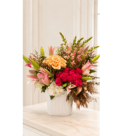 Peach and Passion Elegance. An arrangement by Floral Lady Design Studio LLC. Peach and Passion Elegance. An arrangement by Floral Lady Design Studio LLC.