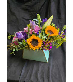 Sunlit Purse Bouquet. An arrangement by Rosemar Flowers and Gifts. Sunlit Purse Bouquet. An arrangement by Rosemar Flowers and Gifts.