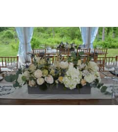 LONG and LOW CENTERPIECE FOR THIN TABLE. An arrangement by Flowers by Priscilla. LONG and LOW CENTERPIECE FOR THIN TABLE. An arrangement by Flowers by Priscilla.