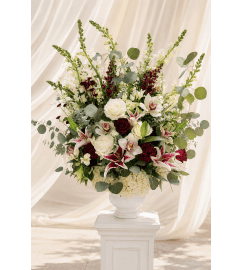 Large pedestal entrance urn arrangement. An arrangement by Floral Lady Design Studio LLC. Large pedestal entrance urn arrangement. An arrangement by Floral Lady Design Studio LLC.