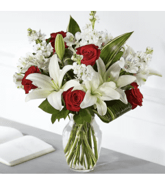 Crimson and Ivory Elegance. An arrangement by Andreas Flowers Kissimmee.
