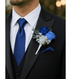 Blue Elegance Boutonniere. An arrangement by Floral Lady Design Studio LLC. Blue Elegance Boutonniere. An arrangement by Floral Lady Design Studio LLC.
