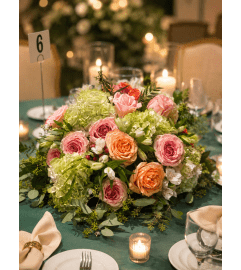 Garden of Grace wedding centerpiece. An arrangement by Floral Lady Design Studio LLC. Garden of Grace wedding centerpiece. An arrangement by Floral Lady Design Studio LLC.
