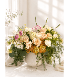 Peach and Petal Embrace. An arrangement by Floral Lady Design Studio LLC. Peach and Petal Embrace. An arrangement by Floral Lady Design Studio LLC.