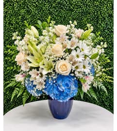 Blue Meadow Elegance. An arrangement by Cincyfloralnista. Blue Meadow Elegance. An arrangement by Cincyfloralnista.